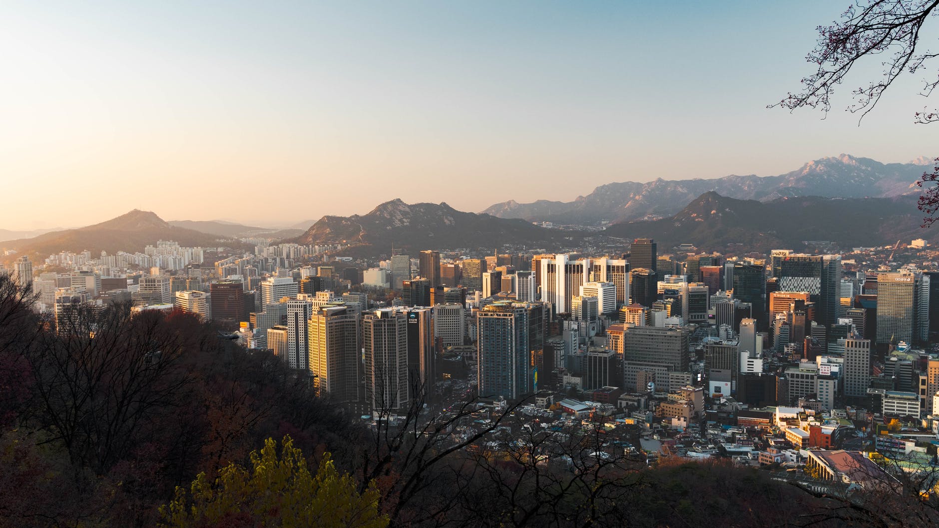 urban area surrounded by mountain range